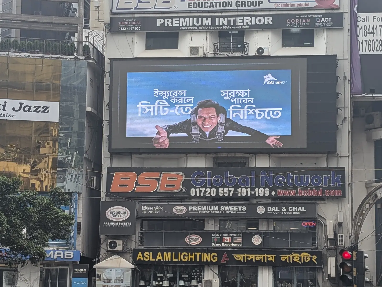 Close view of a building-mounted LED billboard