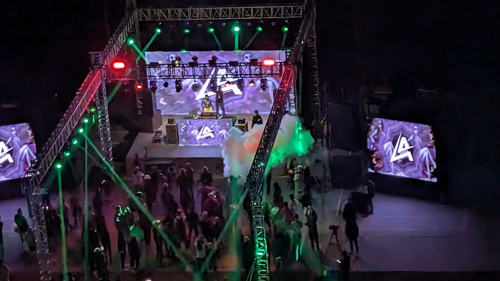 DJ stage with LED screens and lasers