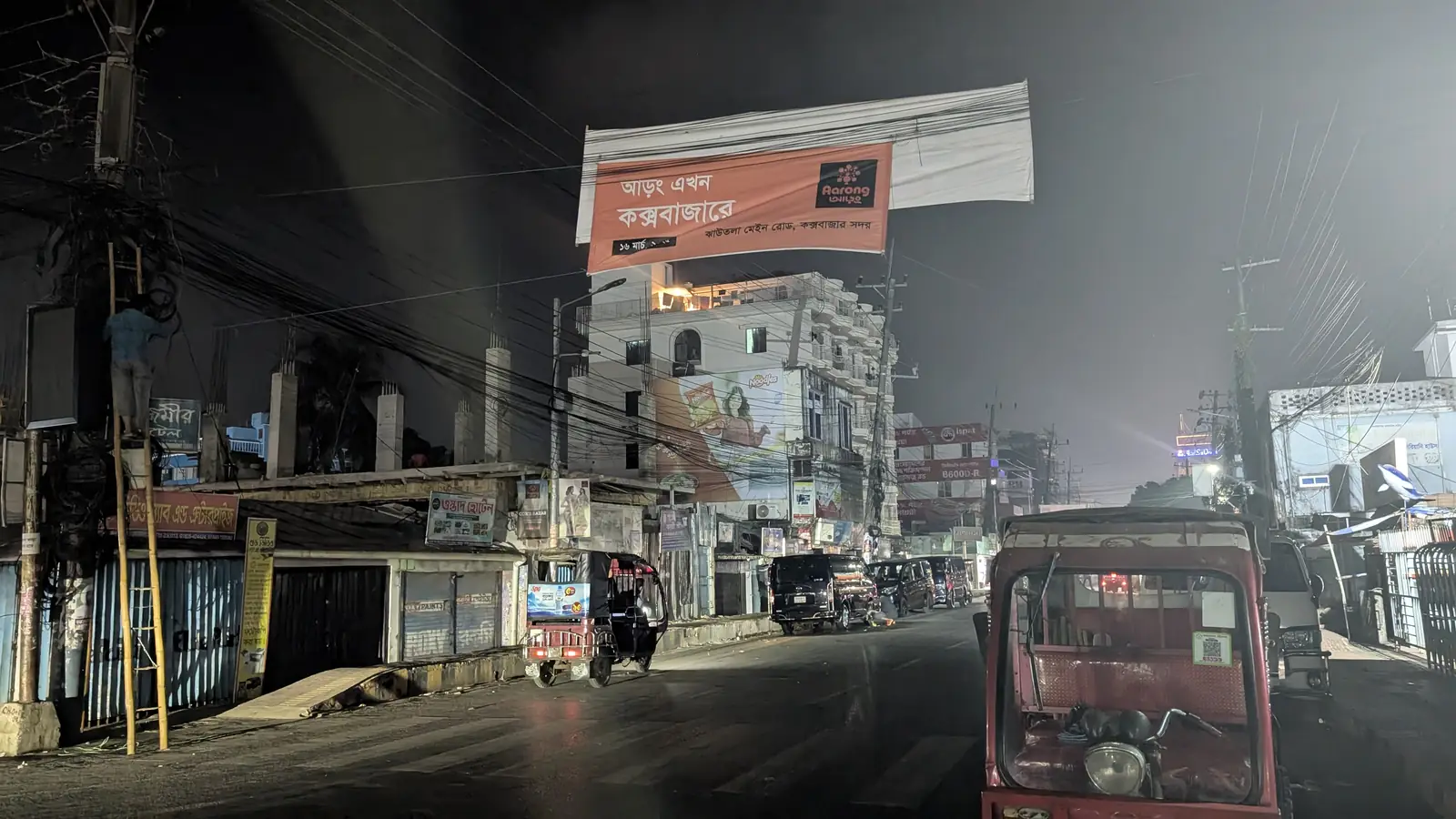 Crew installing outdoor advertising