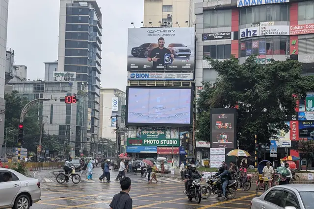 LED billboard above the evening traffic