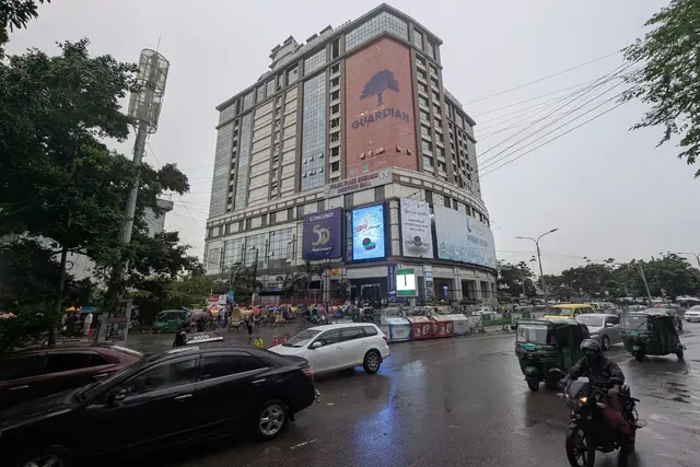 LED screens over a Dhaka intersection